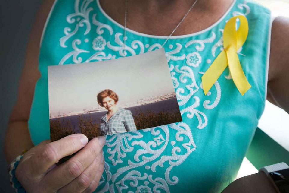 Woman holding a photograph