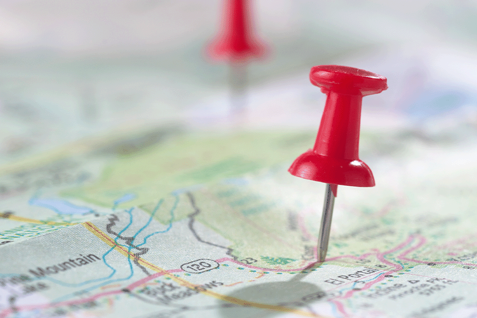 Thumbtack in a map
